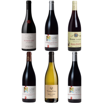 An assortment of six wine bottles from Burgundy, featuring five red and one white wines, with labels visible.