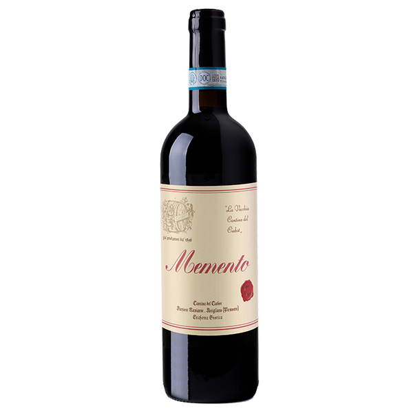 A bottle of red wine labeled 'Memento' with an intense ruby red color, indicating it is a SuperPiemonte blend of Dolcetto and Pinot Noir grapes.